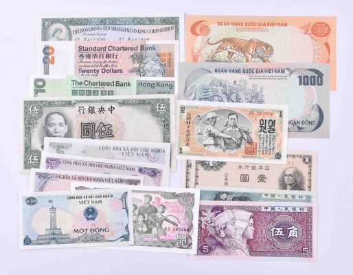 A group of banknotes from Asia